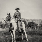 James Daniel McCammon in his younger years, embodying the spirit of Texas cowboy culture.