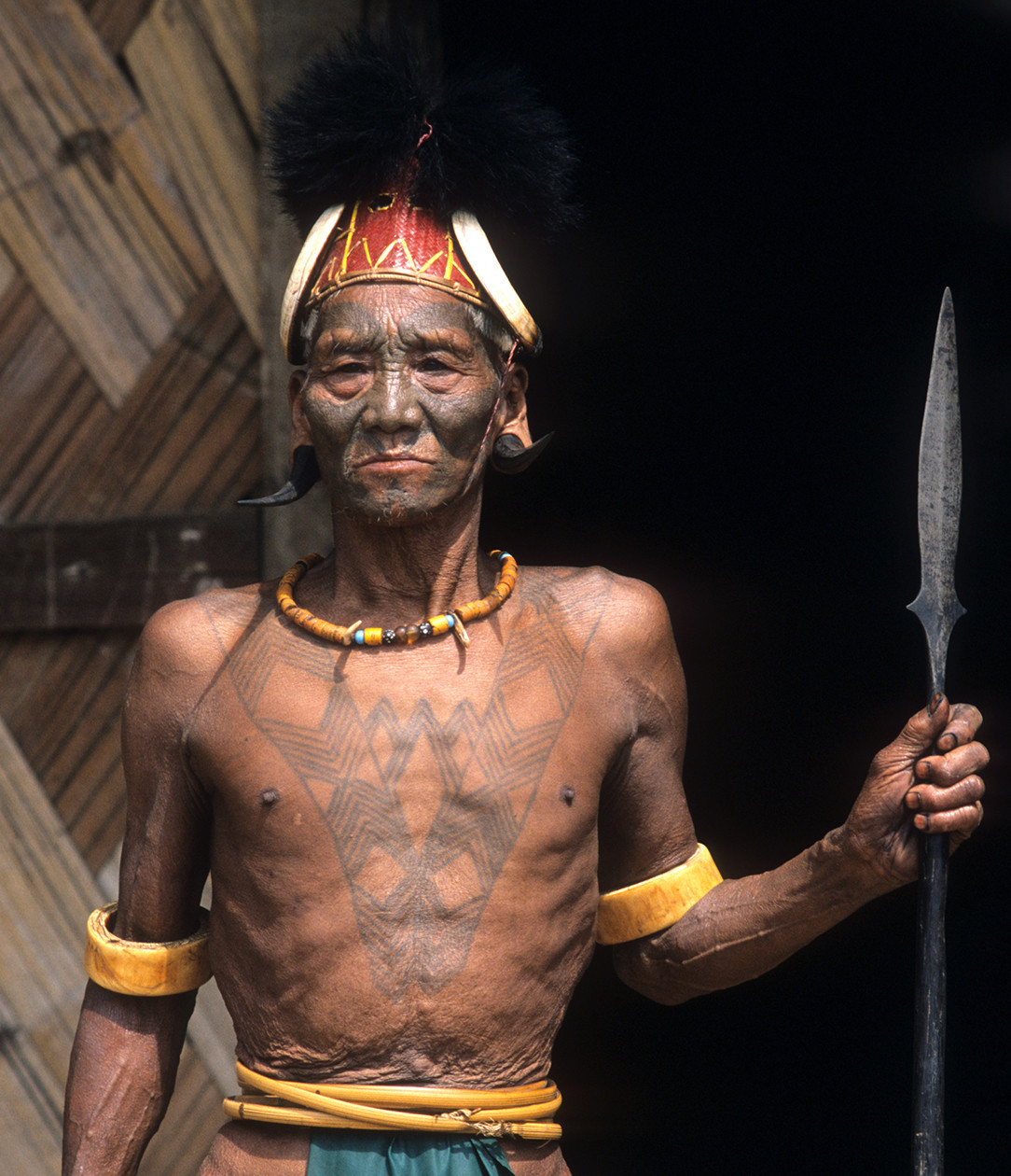 Konyak warrior Lanang, displaying facial and chest tattoos for combat and kills