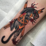 Classic black panther tattoo on leg
