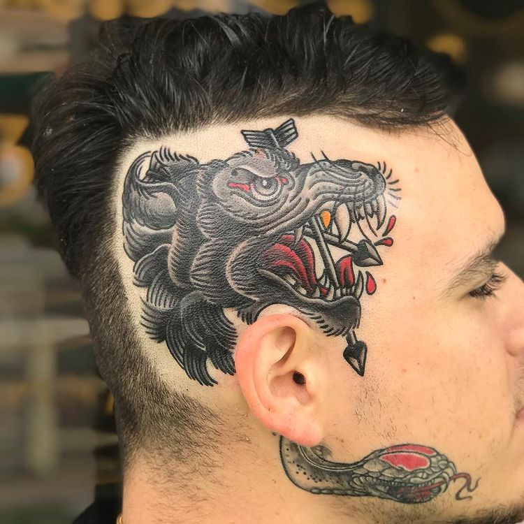 badass head tattoo with geometric design