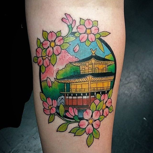 Pagoda and cherry blossom tattoo in traditional Japanese style by Jess Martucci