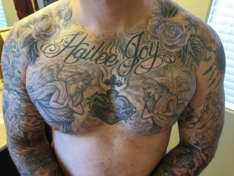 Chest tattoo, details are not fully visible, but it represents a tribute to Jason L.'s daughter and his advocacy against bullying.