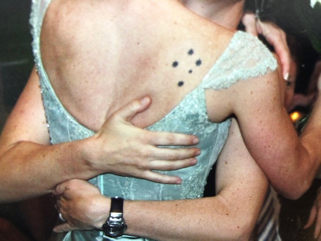 Julie's Southern Cross tattoo on her wedding day