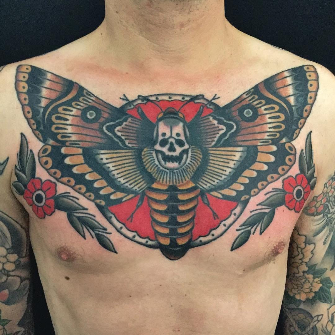 Bold and colorful traditional eagle tattoo, showcasing the patriotic and powerful symbolism often found in traditional tattoo style.