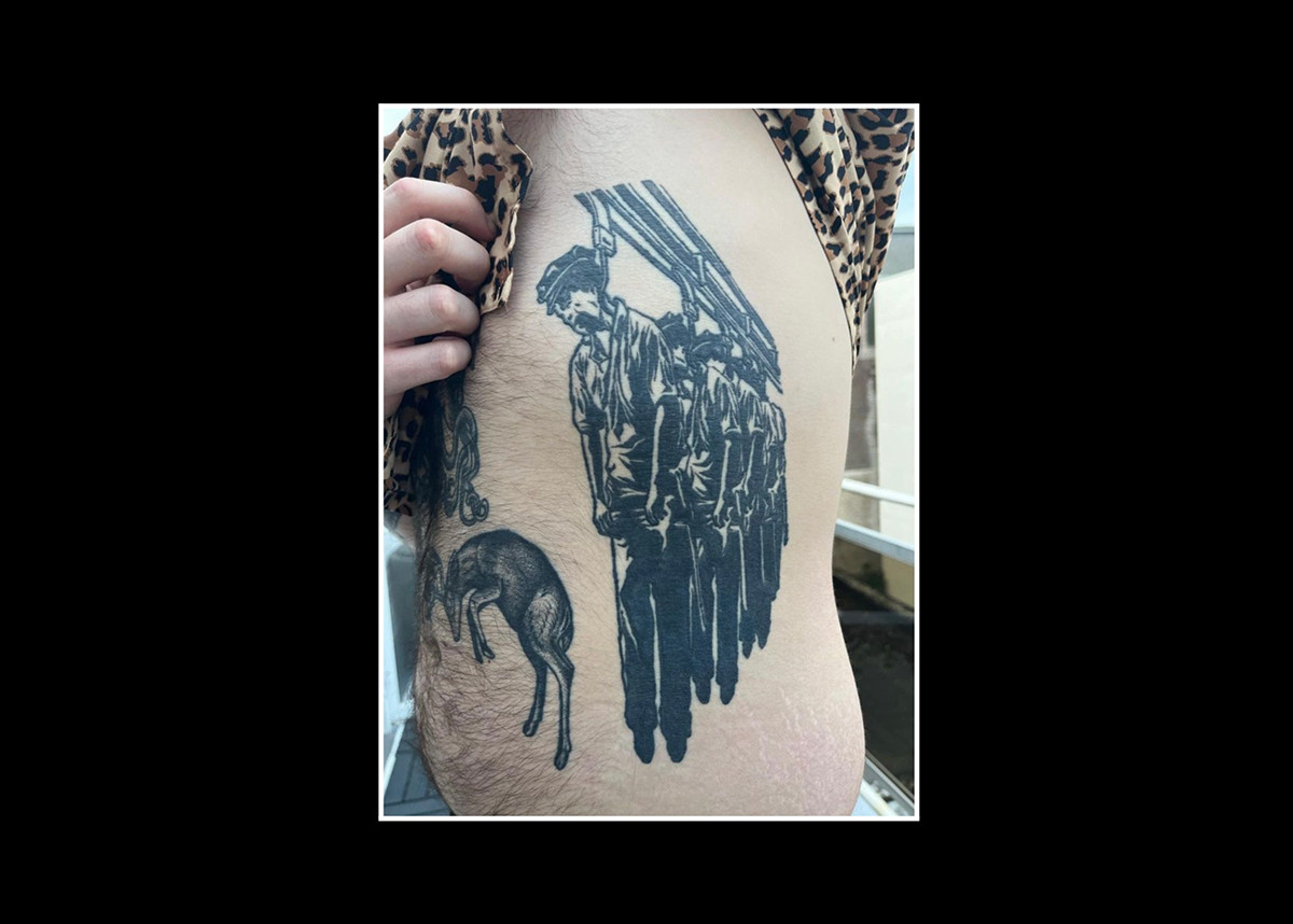 ACAB tattoos – black ink, illustrative tattoo of four dead bodies in uniform hanging from a meat factory hook - anti police brutality tattoo