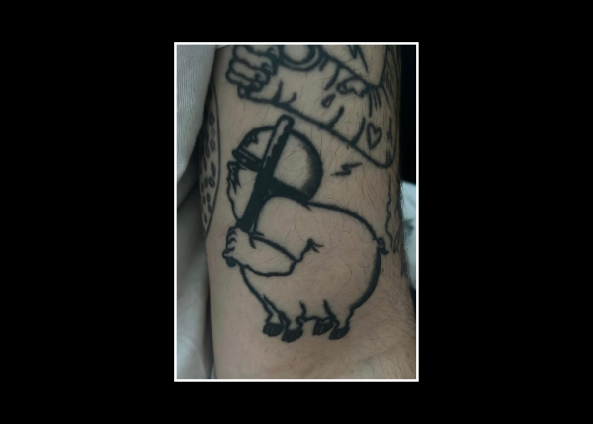 ACAB tattoos – black ink illustrative tattoo of a pig wearing a police helmet and carrying a baton - pig cop tattoo design