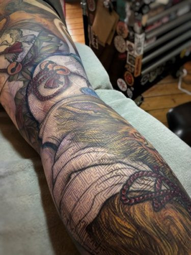 Further color development in the Kitsune tattoo, demonstrating the layering and depth created with color