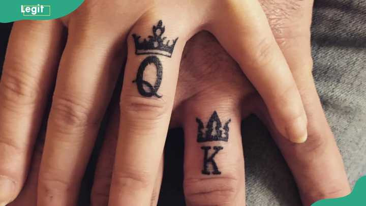 King and queen ring tattoos representing a powerful and equal partnership in love.