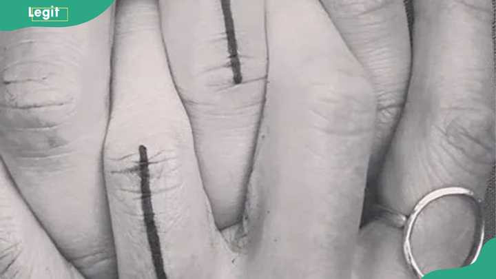 Vertical lines tattoo symbolizing strength, unity, and an unbreakable bond.