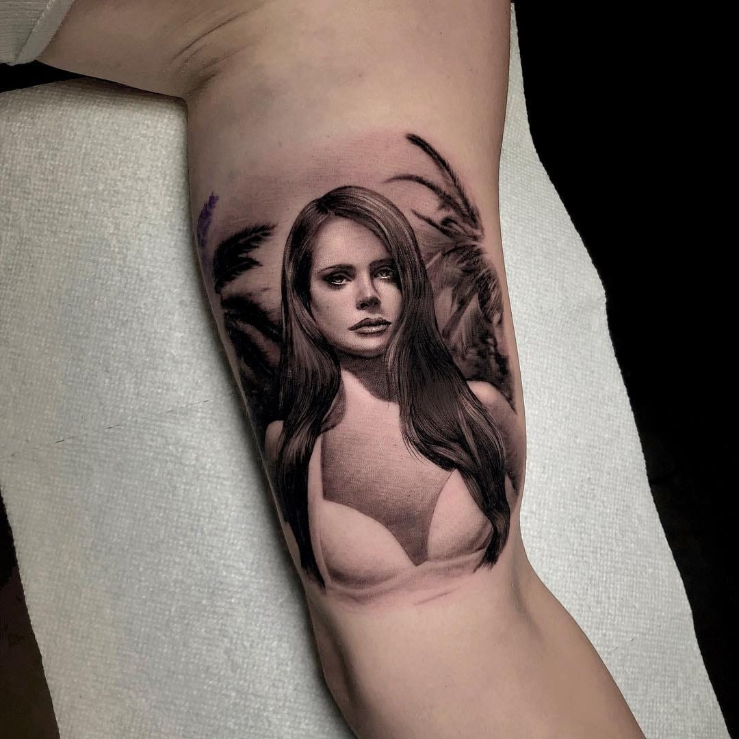 Vibrant and colorful pin-up girl tattoo.