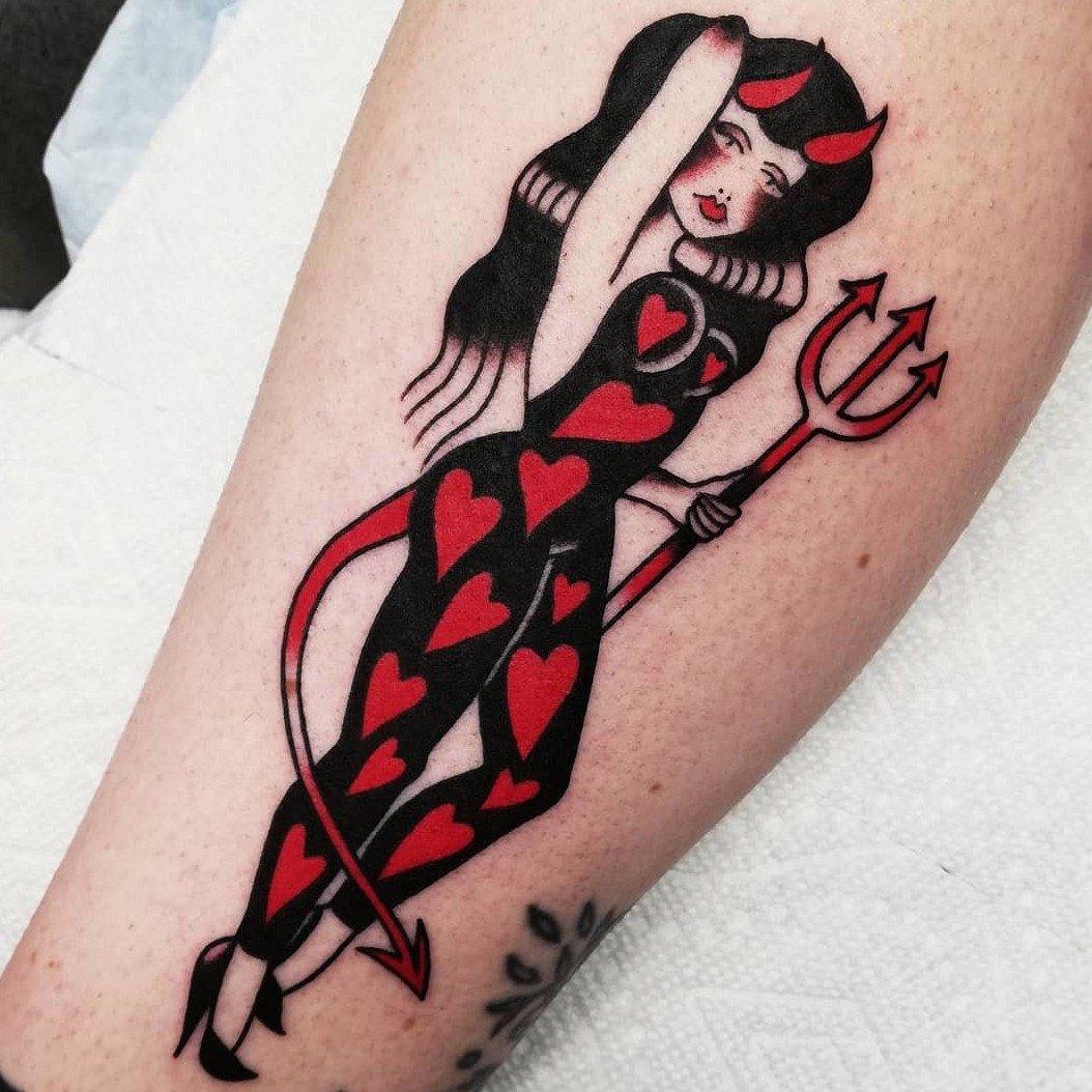 Elegant black and grey pin-up girl tattoo portrait.