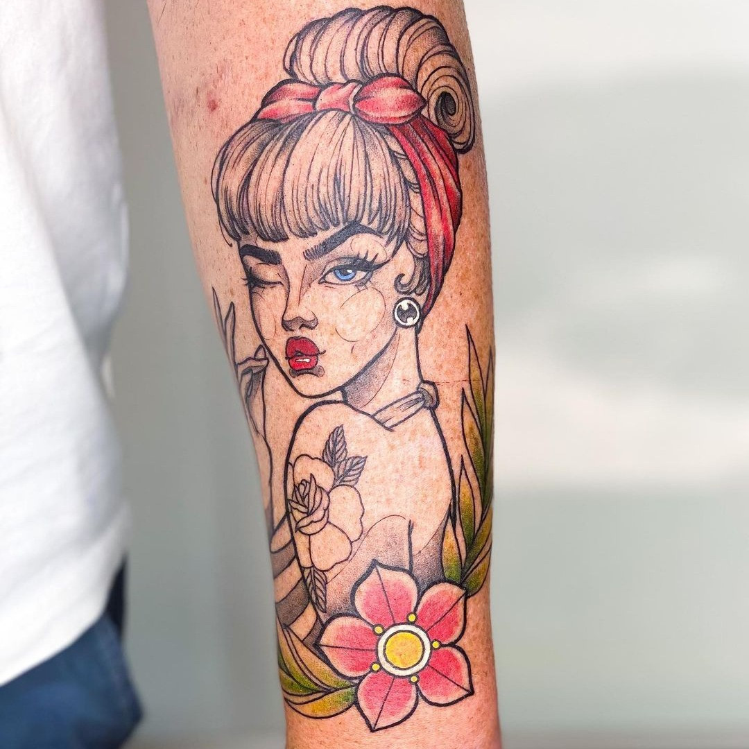 Collection of diverse female pin-up tattoos showcasing different styles and designs.