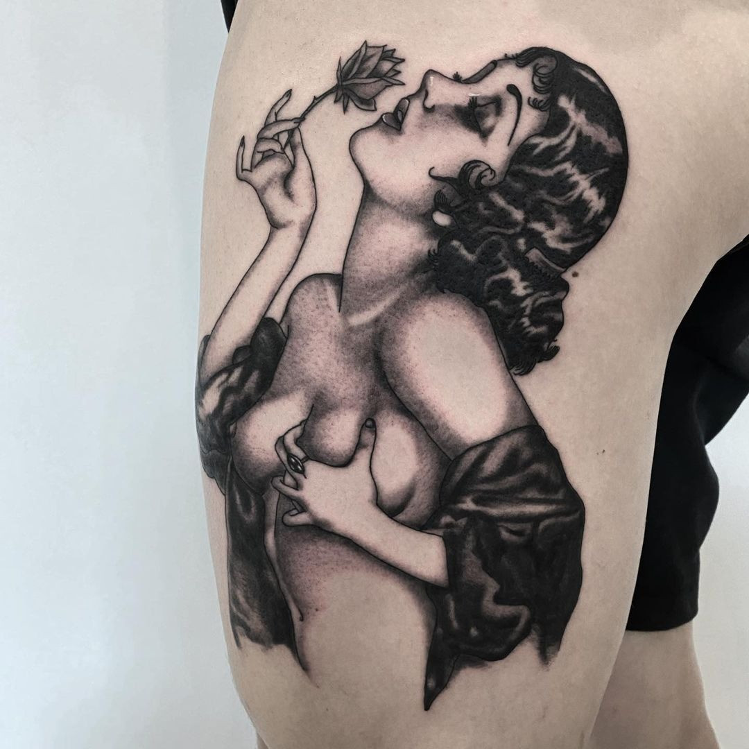 Patriotic female pin-up tattoo with a wartime theme, representing strength and support for the troops.