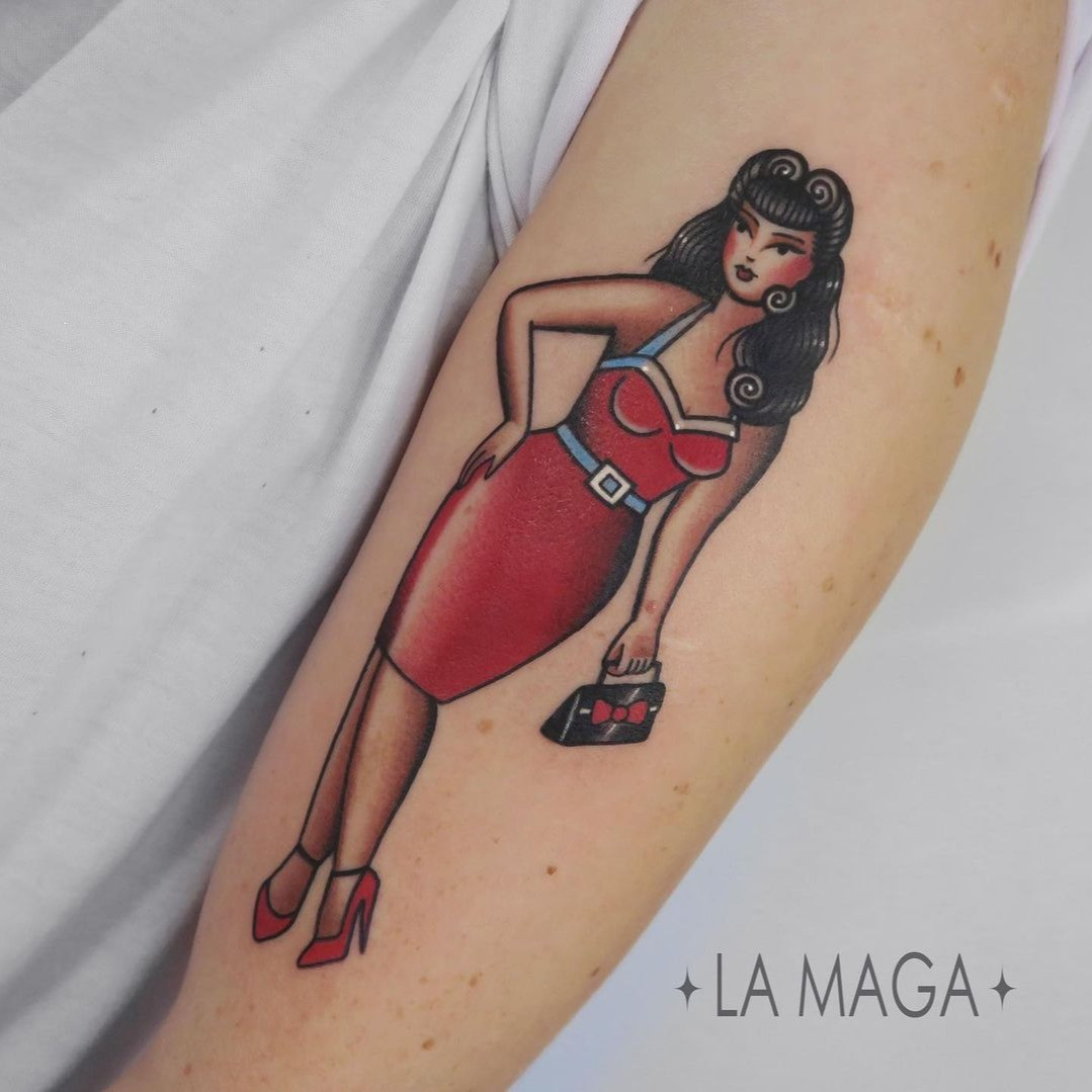 Timeless female pin-up tattoo reflecting the enduring artistic legacy of pin-up illustrators.