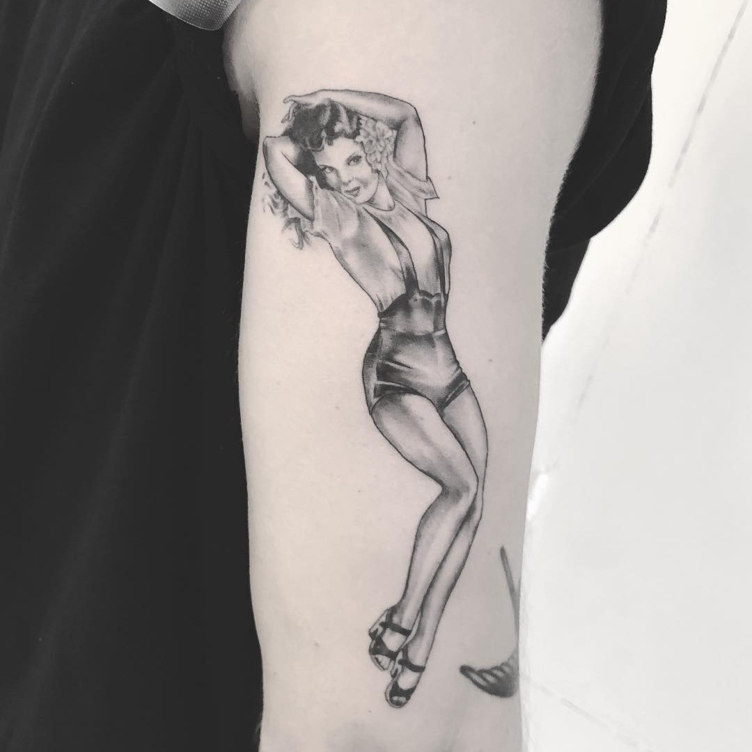 Selection of female pin-up tattoos highlighting the range of styles and artistic approaches.