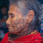 Facial tattoos of Anna Aghtuqaayak of Gambell, St. Lawrence Island, 1997, showcasing traditional designs and their cultural significance.