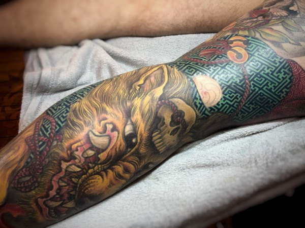 Vibrant color details in the Kitsune tattoo, emphasizing the depth and richness of the chosen hues