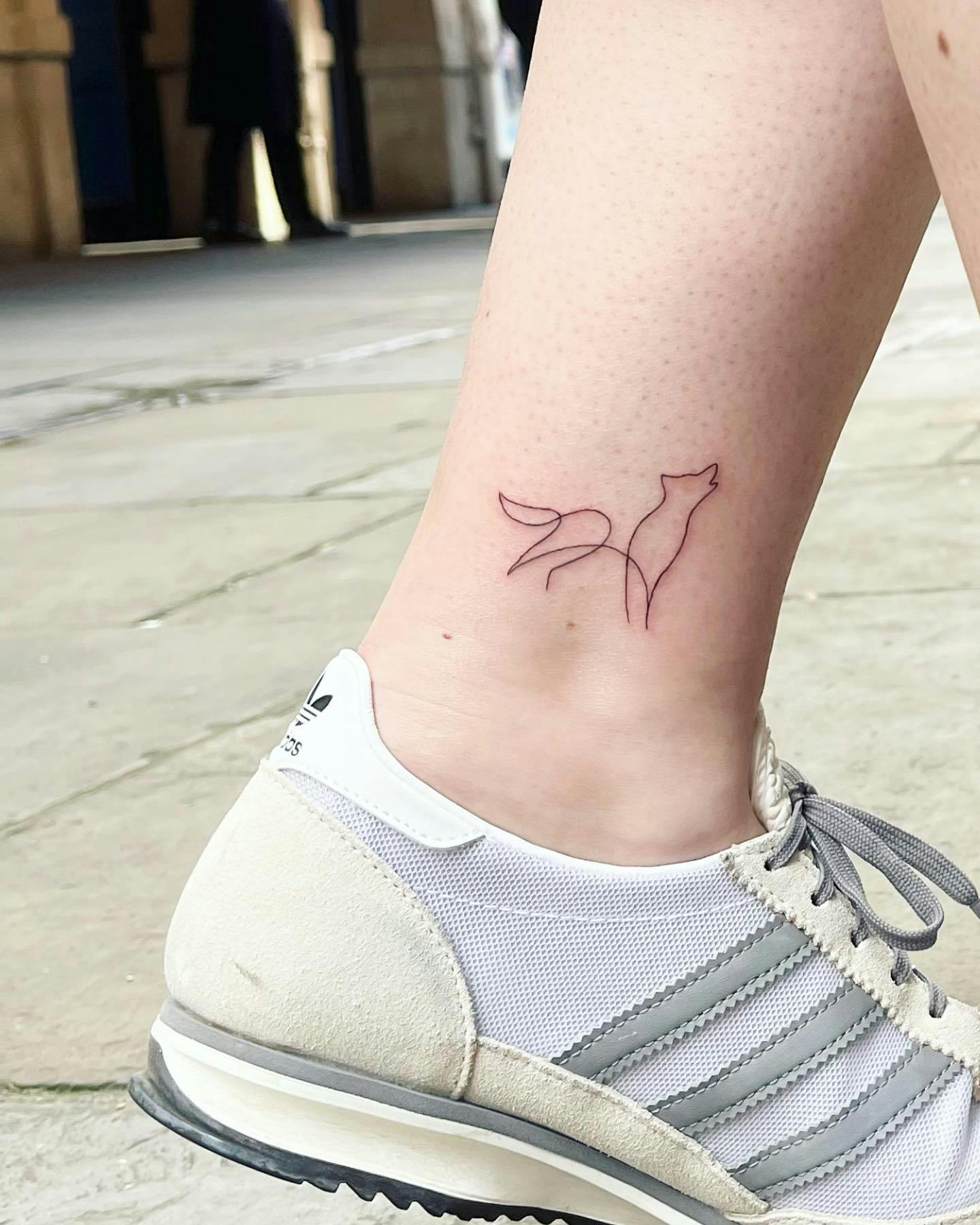 Fox line art ankle tattoo design