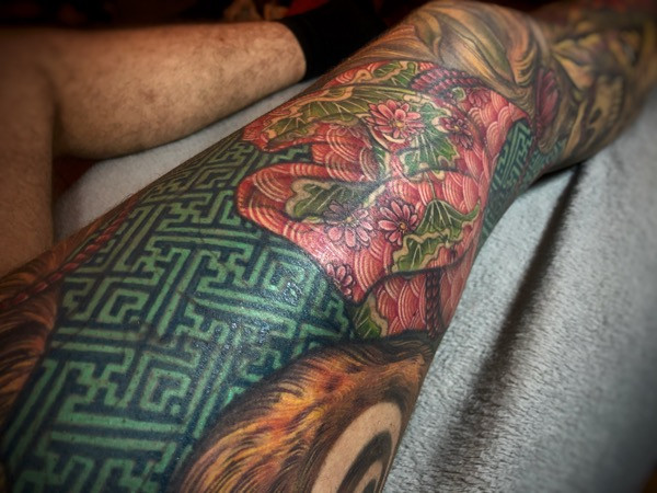 Rich color application to the Kitsune tattoo, demonstrating the artist's skill in color blending and vibrancy