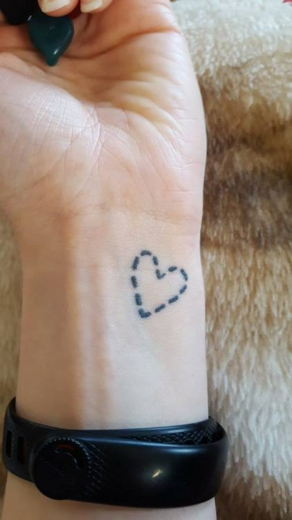 a tattoo of a heart