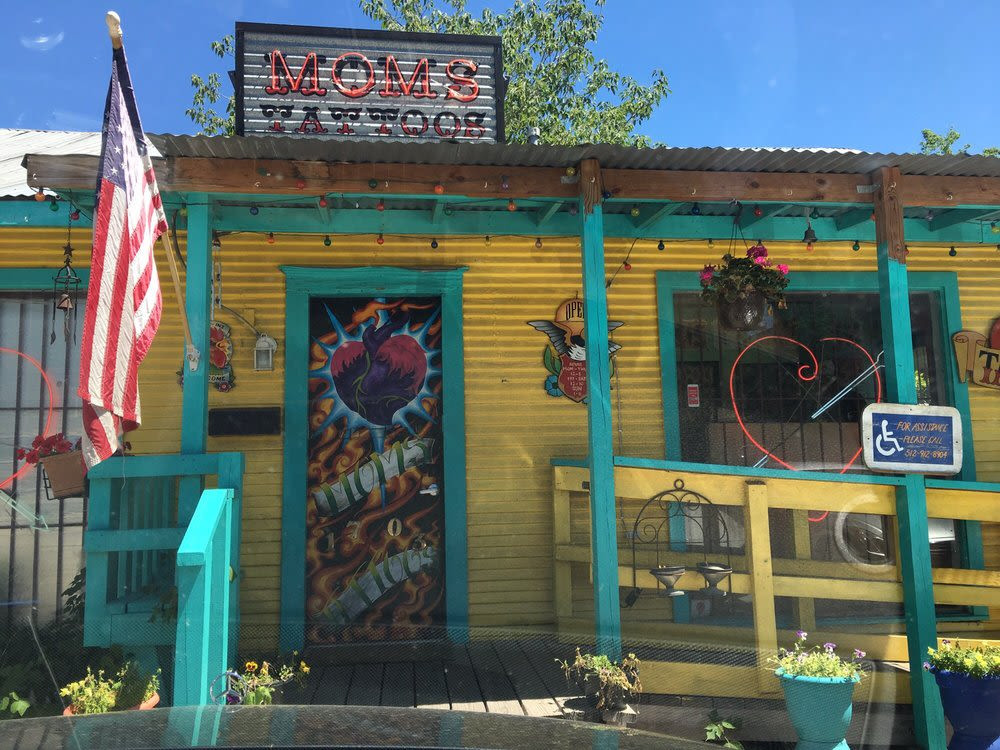 Mom's Tattoos shop front in South Lamar Blvd, Austin TX, a long-standing tattoo destination.