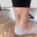 Rose ankle tattoo idea for women