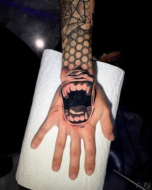 Striking 3D hand tattoo with meticulous detail, making a bold and visible statement.