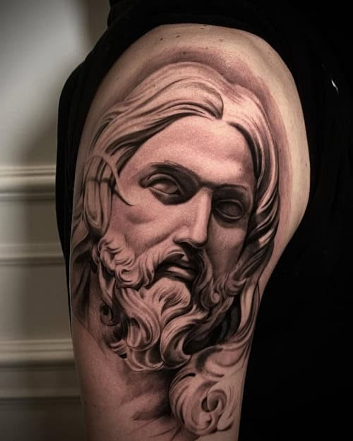 Detailed 3D Jesus tattoo with emotional depth and intricate shading, expressing religious faith.