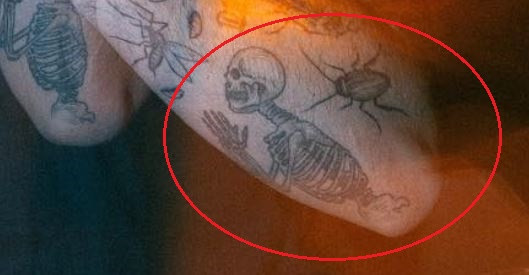 Ruby da Cherry's roach tattoos on his left arm