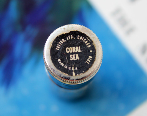 Tattoo lipstick in Coral Sea shade, providing a real-world example of the product and shade name