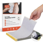 Close-up of tattoo transfer paper layers