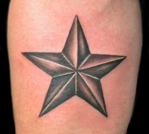 Nautical star tattoo, a symbol of guidance and protection, often rendered in classic shades.