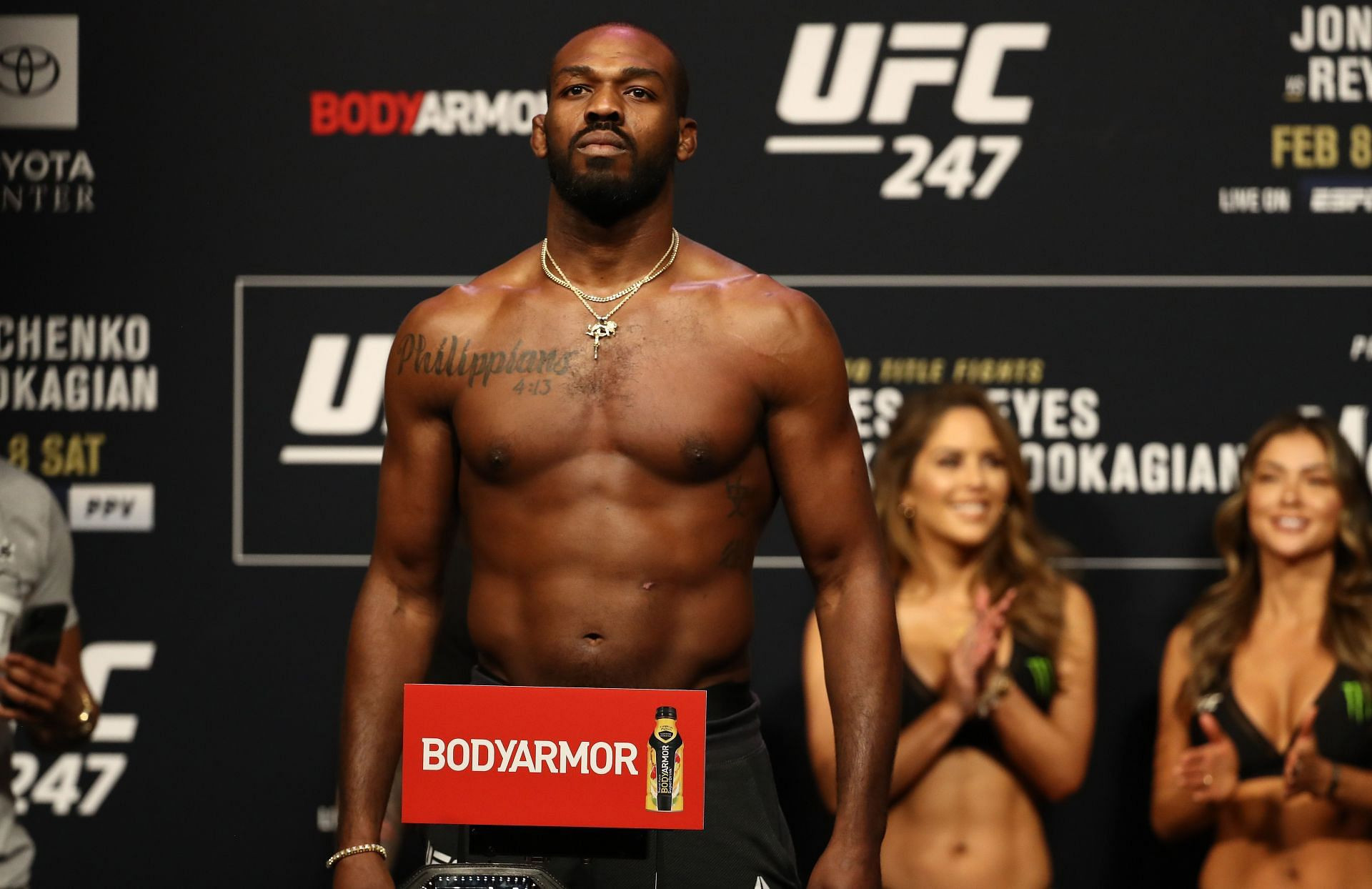 Close-up of Jon Jones' Gaidojutsu tattoo on his left ribs during the UFC 247 weigh-ins, showcasing the vertical Japanese Kanji symbols representing his martial arts style.