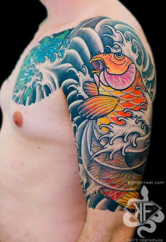 Koi half sleeve with chrysanthemum chest plate tattoo by Kian Horisumi Forreal, a half sleeve extending to the chest, combining koi with chrysanthemums, symbolizing perseverance, longevity, and honor.