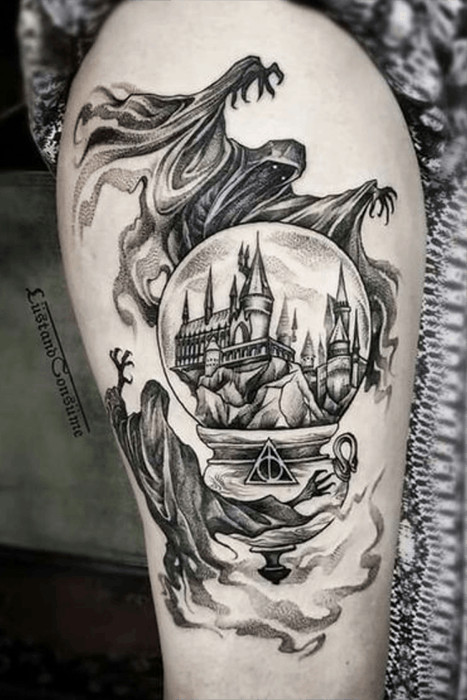 Hogwarts snowglobe tattoo with Dementors, a creative and slightly darker Harry Potter tattoo concept