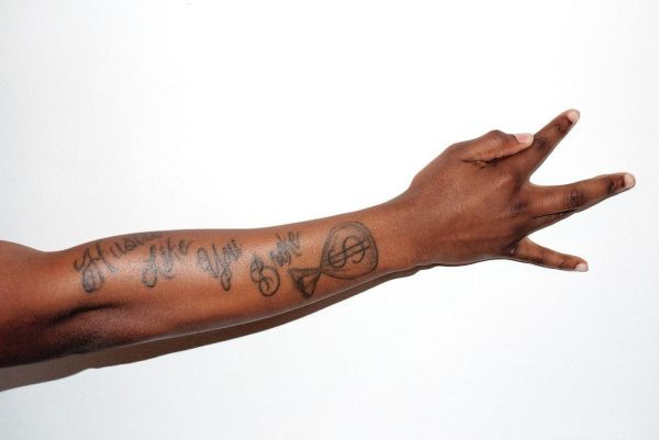 Kendrick Lamar's "DAMN." album cover tattooed