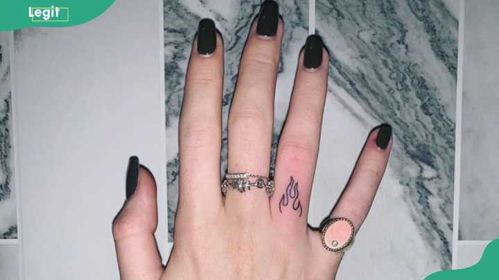 Fire tattoo as a passionate symbol of intense and unwavering love.