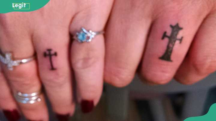 Cross tattoo for soulmate wedding rings symbolizing a sacred and spiritual bond.