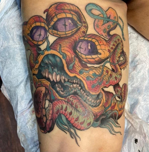 Creative octopus and monster tattoo in black and gray by Dave Nyegaard