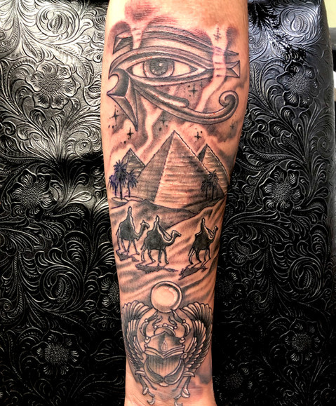 Intricate Egyptian themed tattoo in black and gray by Kevin Craig