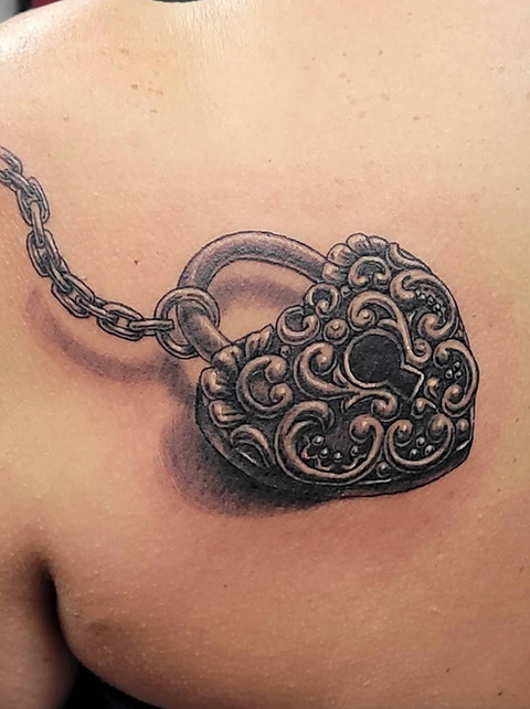 Intricate black and gray lock and key tattoo design by Jenna Totten