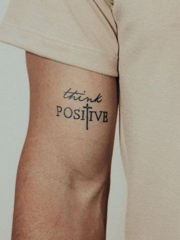 Quote Tattoo: Minimalist Word Tattoo for Men