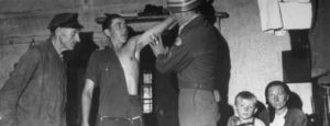 American soldiers searching for SS members post-WWII