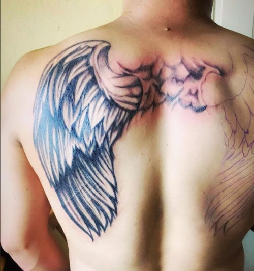 Classic angel back tattoo, offering the largest canvas for dramatic and detailed wing designs.