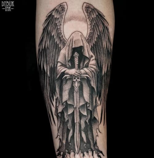 Intricate angel of death tattoo, symbolizing fearlessness and acceptance of mortality.