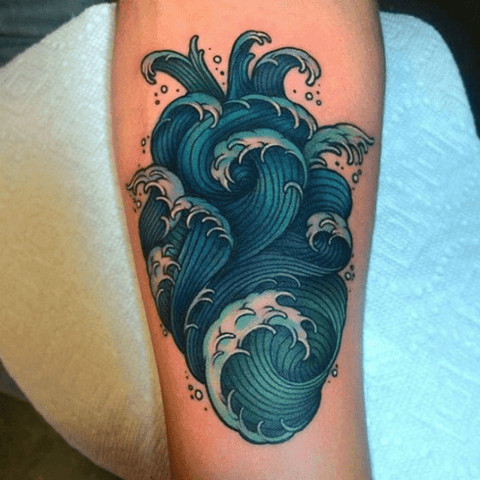 Neo-traditional wave style Aquarius tattoo