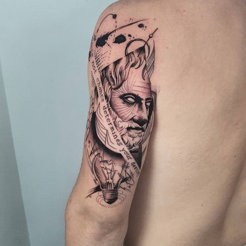 An arm tattoo with a detailed design covering the entire arm of a man, versatile