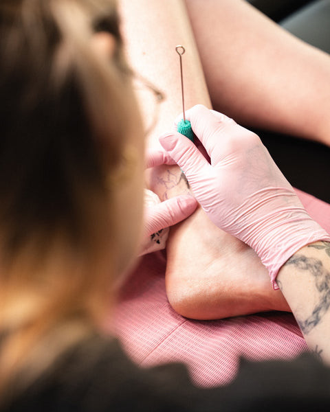 Example of a hand poke tattoo technique, considered gentler than machine tattoos