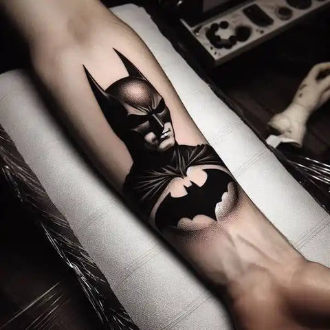 Shaded Batman forearm tattoo design