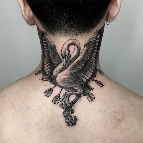 Striking bird neck tattoo for men, a bold and attention-grabbing statement of personal style